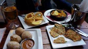 Calamari, Shrimp Tortillas, Paella, and Potatoes with a Texas-Chili-like sauce.